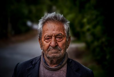 a man with a serious look on his face